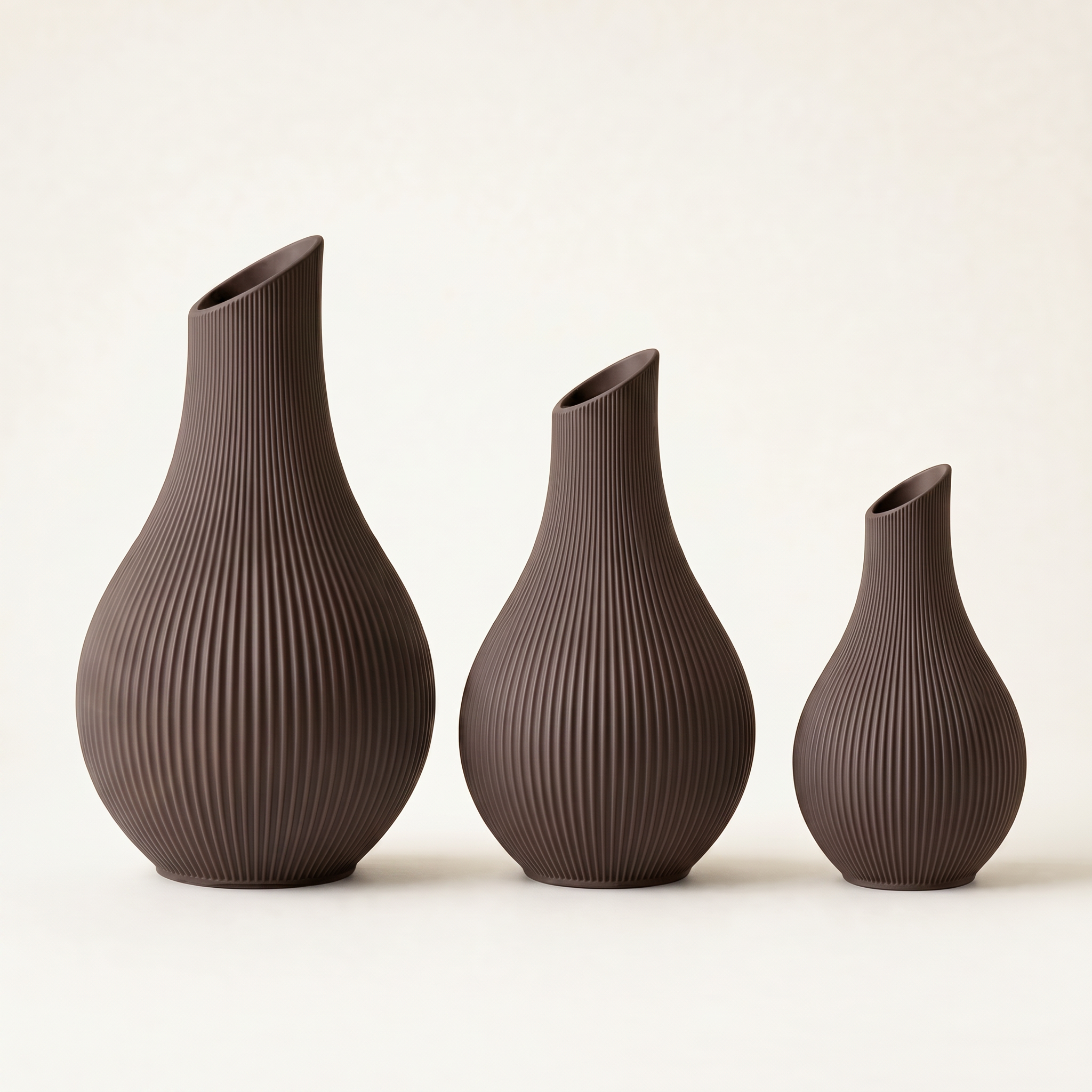 Yazu Vase Größenvergleich 15, 20 und 25 cm in Braun